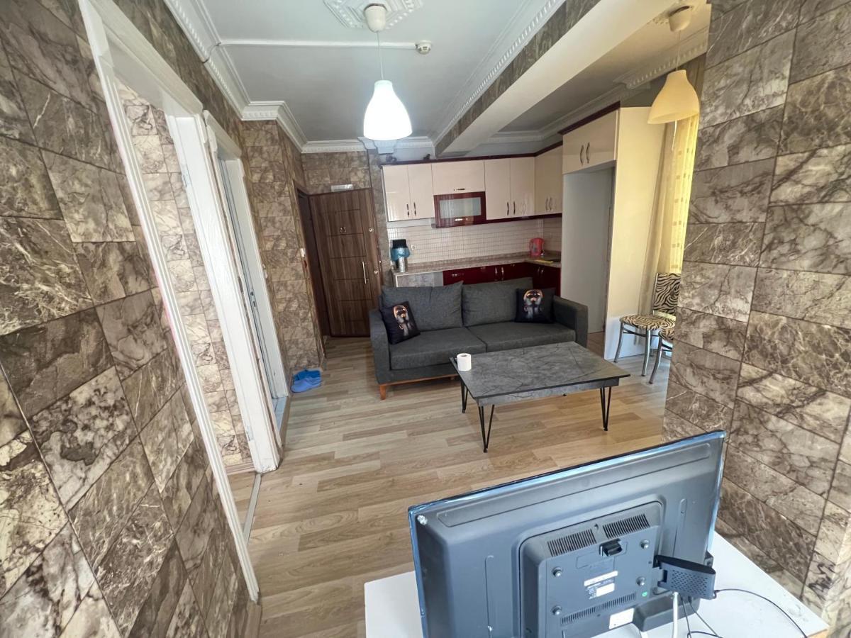 Kizil Apart Buca Bagian luar foto